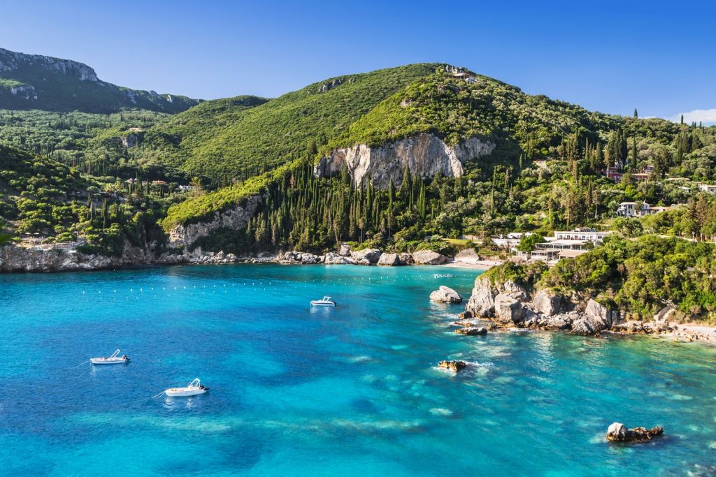 Hire a small boat to see the caves in Paleokastritsa
