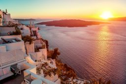 enjoy the stunning sunset in Santorini